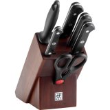 Set of 4 knives in a walnut block #1