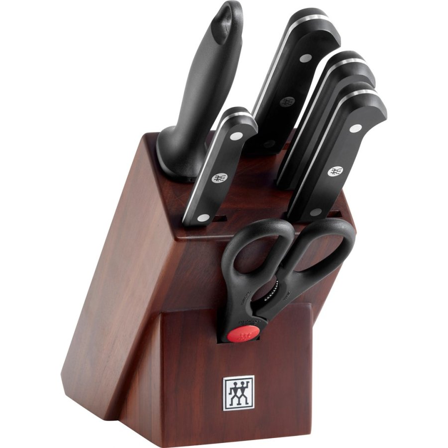 Set of 4 knives in a walnut block #1